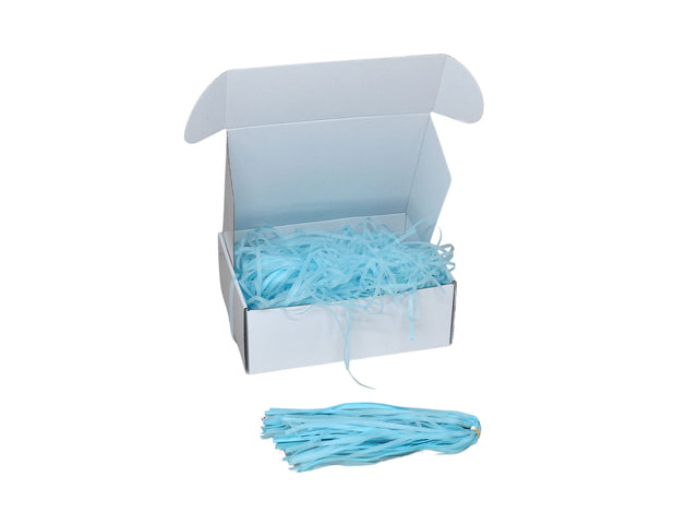 Umplutură din hârtie de mătase bleu expusă într-o cutie cadou albă