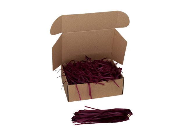 Umplutură din hârtie de mătase grena expusă într-o cutie cadou natur