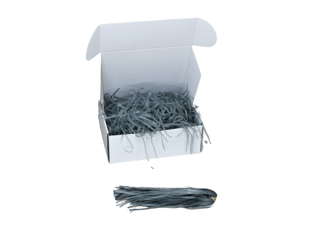 Umplutură din hârtie de mătase gri expusă într-o cutie cadou albă