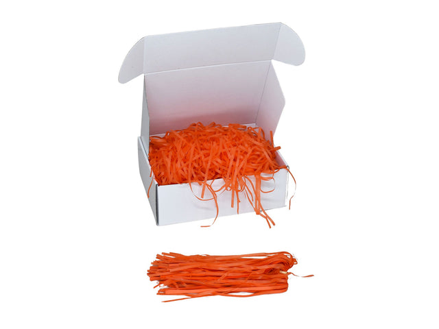 Umplutură din hârtie de mătase portocaliu expusă într-o cutie cadou albă