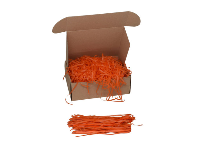 Umplutură din hârtie de mătase portocaliu expusă într-o cutie cadou natur