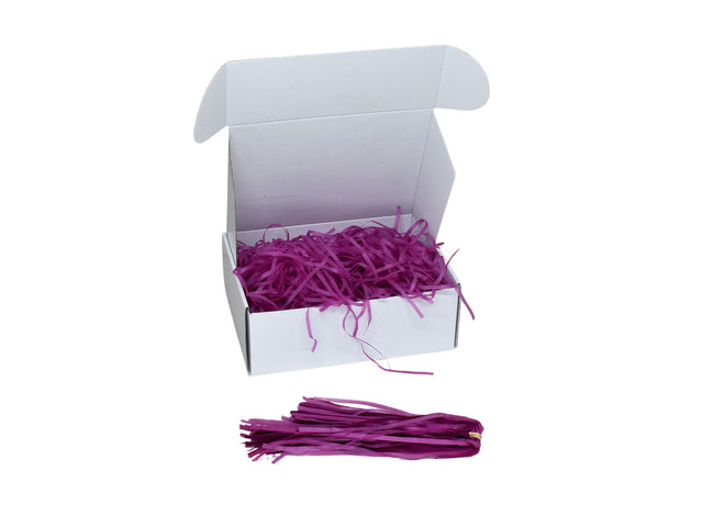 Umplutură din hârtie de mătase prună expusă într-o cutie cadou albă