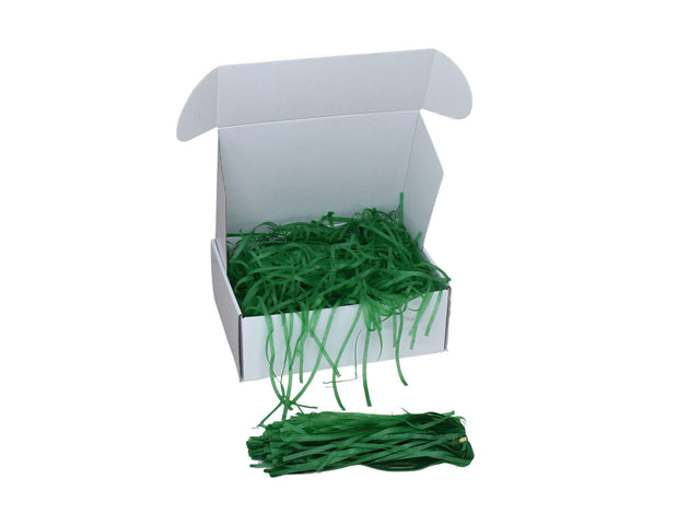 Umplutură din hârtie de mătase verde închis expusă într-o cutie cadou albă