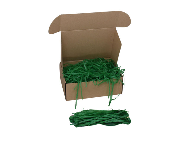 Umplutură din hârtie de mătase verde închis expusă într-o cutie cadou natur