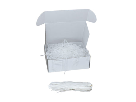 Umplutură din hârtie de mătase albă expusă într-o cutie cadou albă