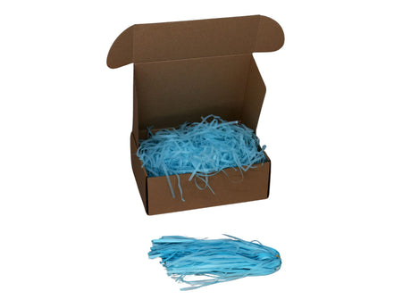 Umplutură din hârtie de mătase bleu expusă într-o cutie cadou natur