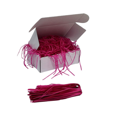 Umplutură din hârtie de mătase cerisse expusă într-o cutie cadou albă