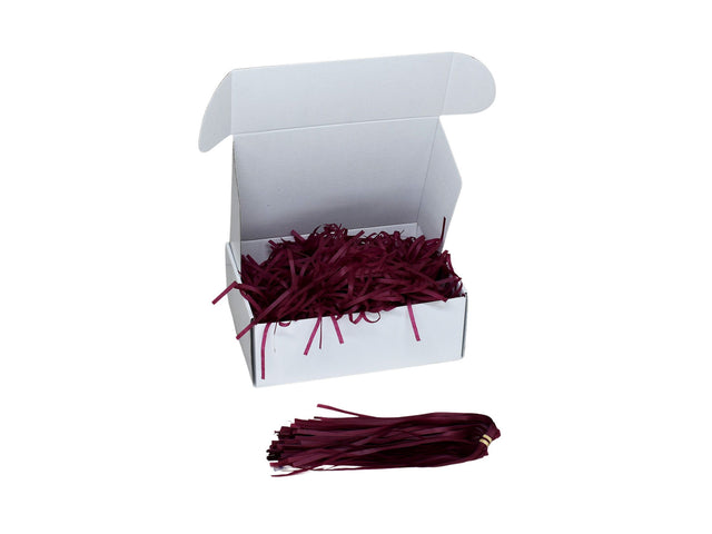 Umplutură din hârtie de mătase grena expusă într-o cutie cadou albă