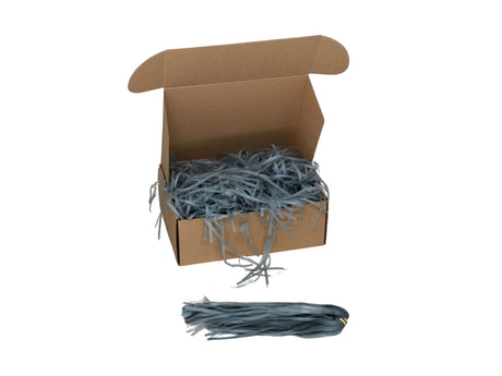 Umplutură din hârtie de mătase gri expusă într-o cutie cadou natur