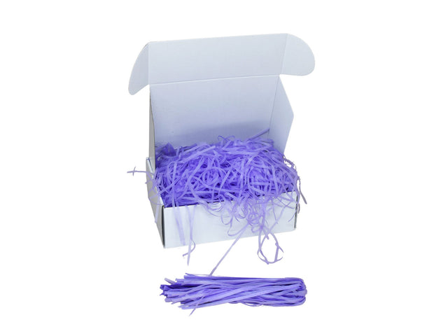 Umplutură din hârtie de mătase lavandă expusă într-o cutie cadou albă